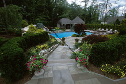 Terraced Bluestone Walk leading to backyard pool - (908) 668-5858
